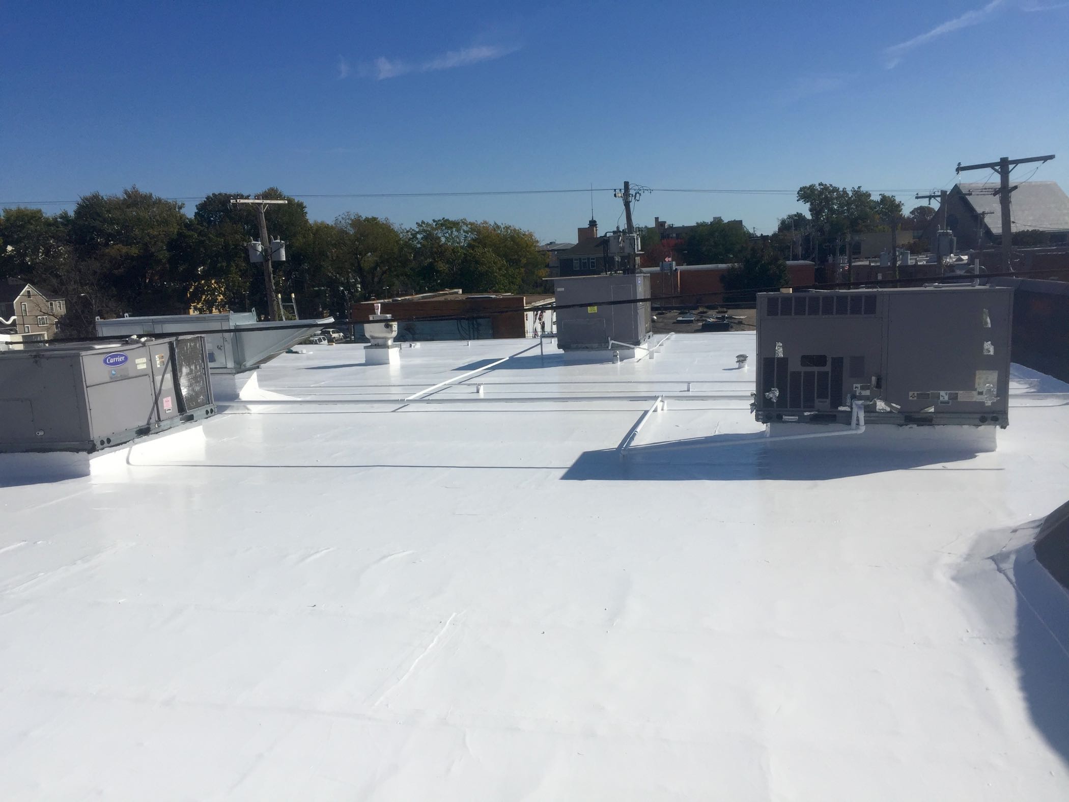 Silicone Roof Coating over Modified Bitumen